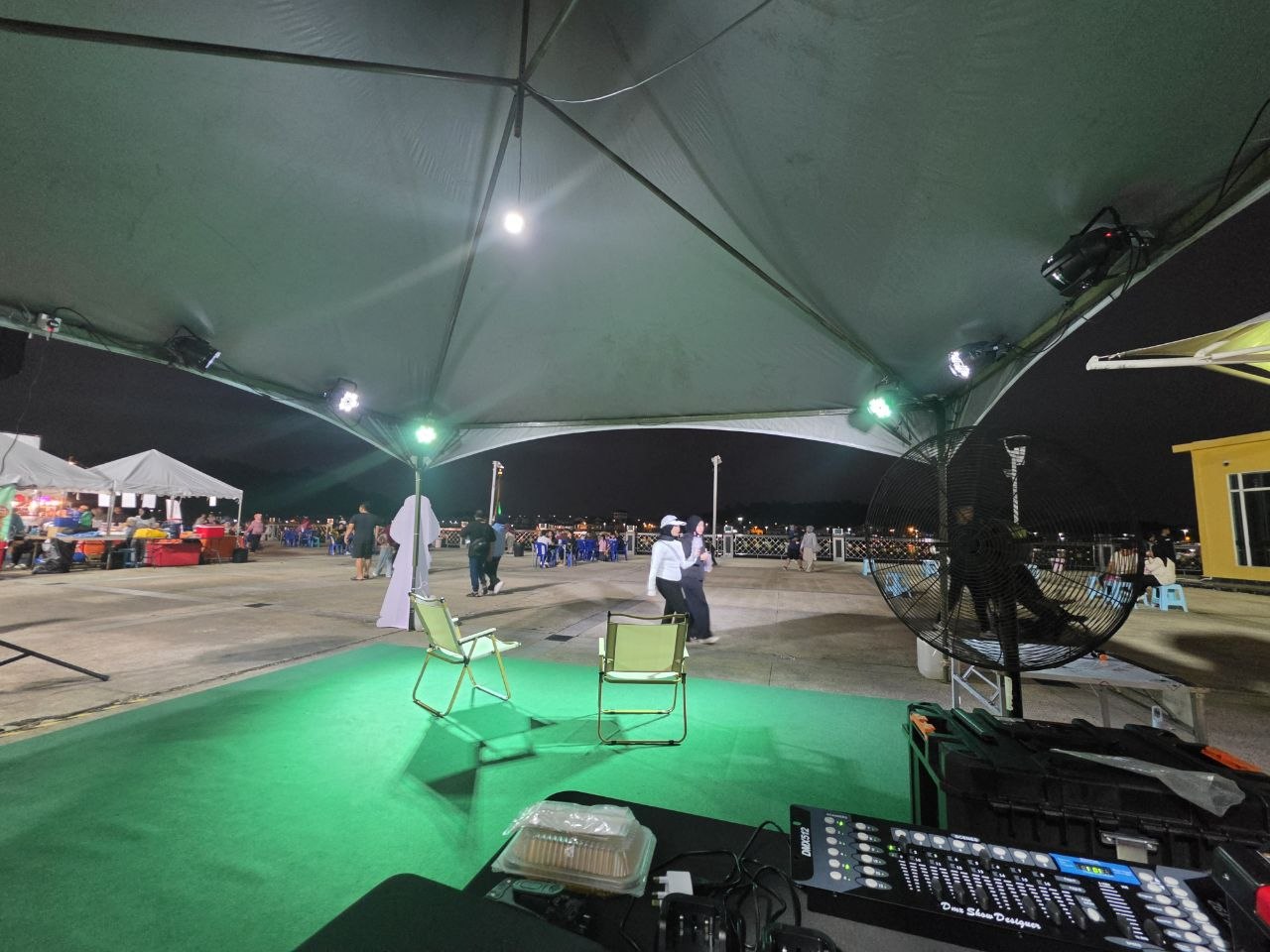 Sound and lighting control position facing the outdoor event area at Pesta Seni Rakyat